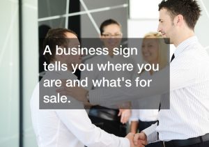 A business sign tells you where you are and what's for sale.